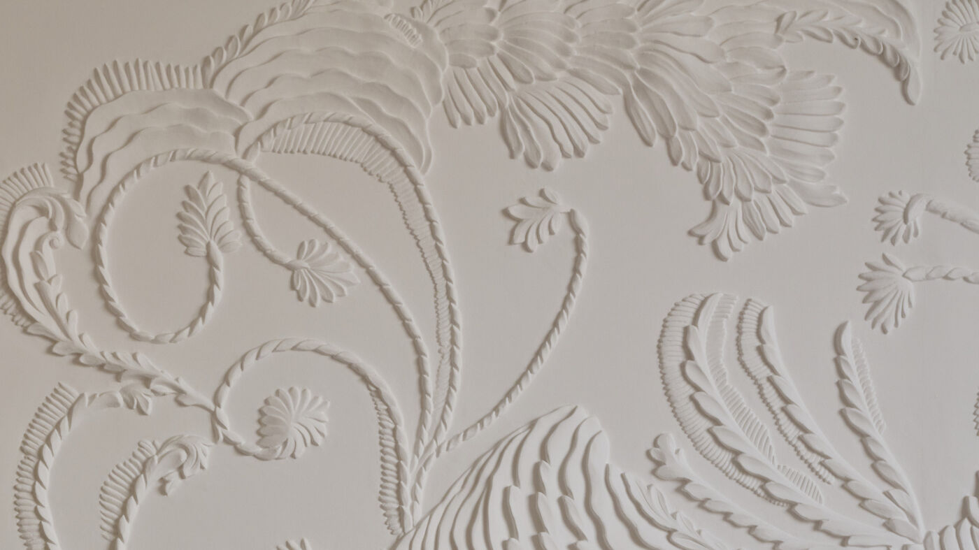 Sculpted plaster relief wall